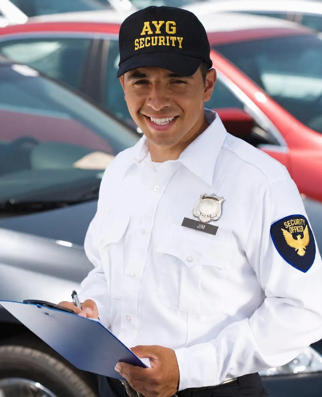 AYG Security officer taking notes in a parking area